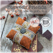 Decorative pillow or pincushion with a fall themed design