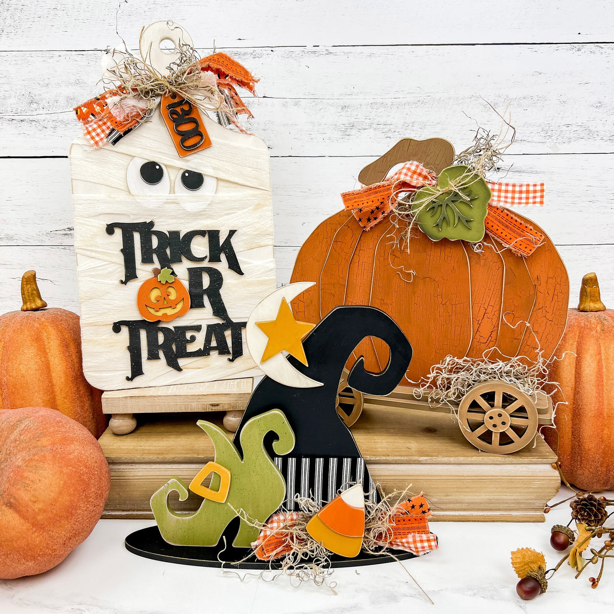 Wood Halloween DIY craft decor with a mummy, witch hat, and pumpkin