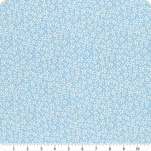 Sky blue fabric with small white floral pattern.