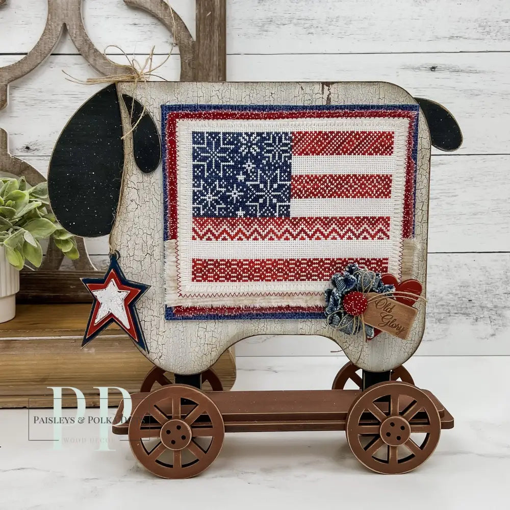 Primitive sheep wood cross stitch backer for displaying finished cross stitch pieces. 