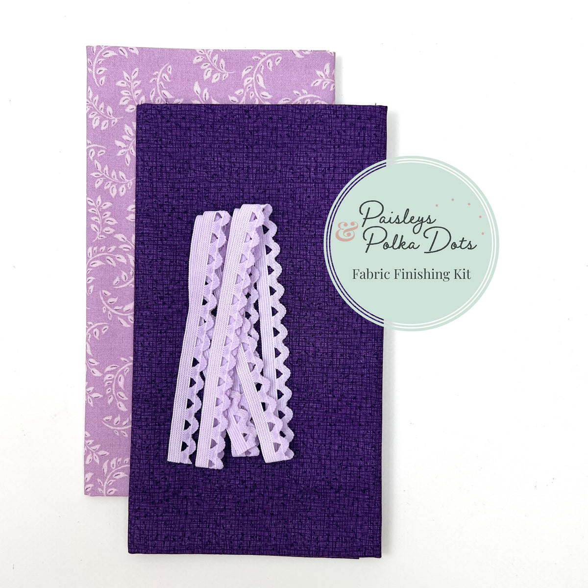 cross stitch fabric finishing kit in purple thatched and lavender purple vine fabric elastic ric-rac trim in lavender