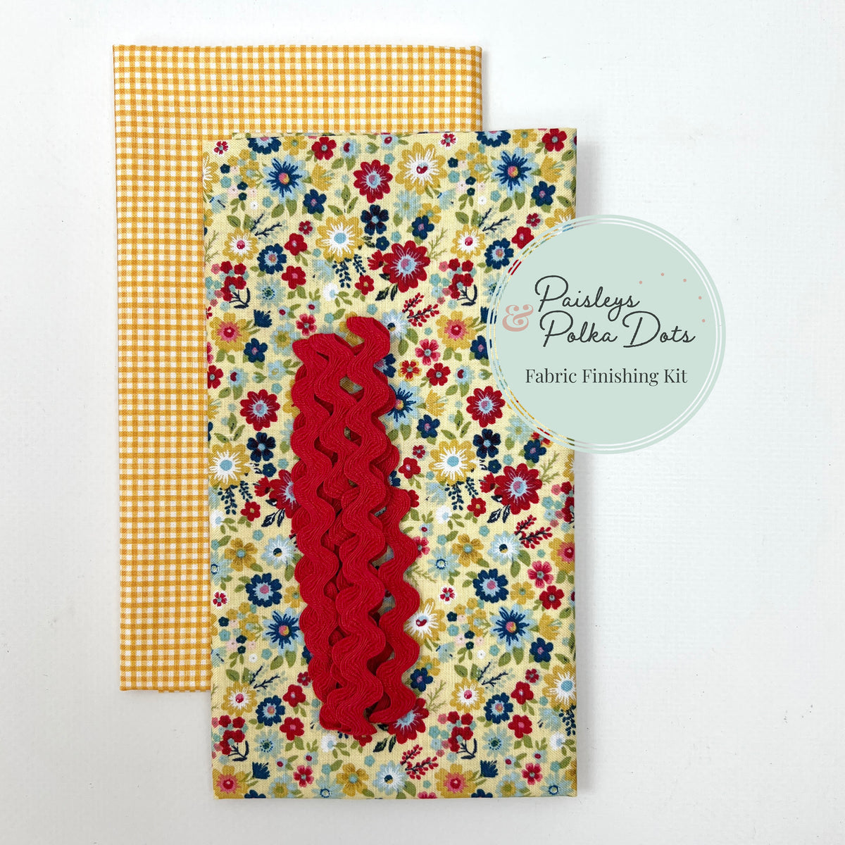 Fabric finishing kit in yellow with floral and checkered gingham patterns red ric-rac trim