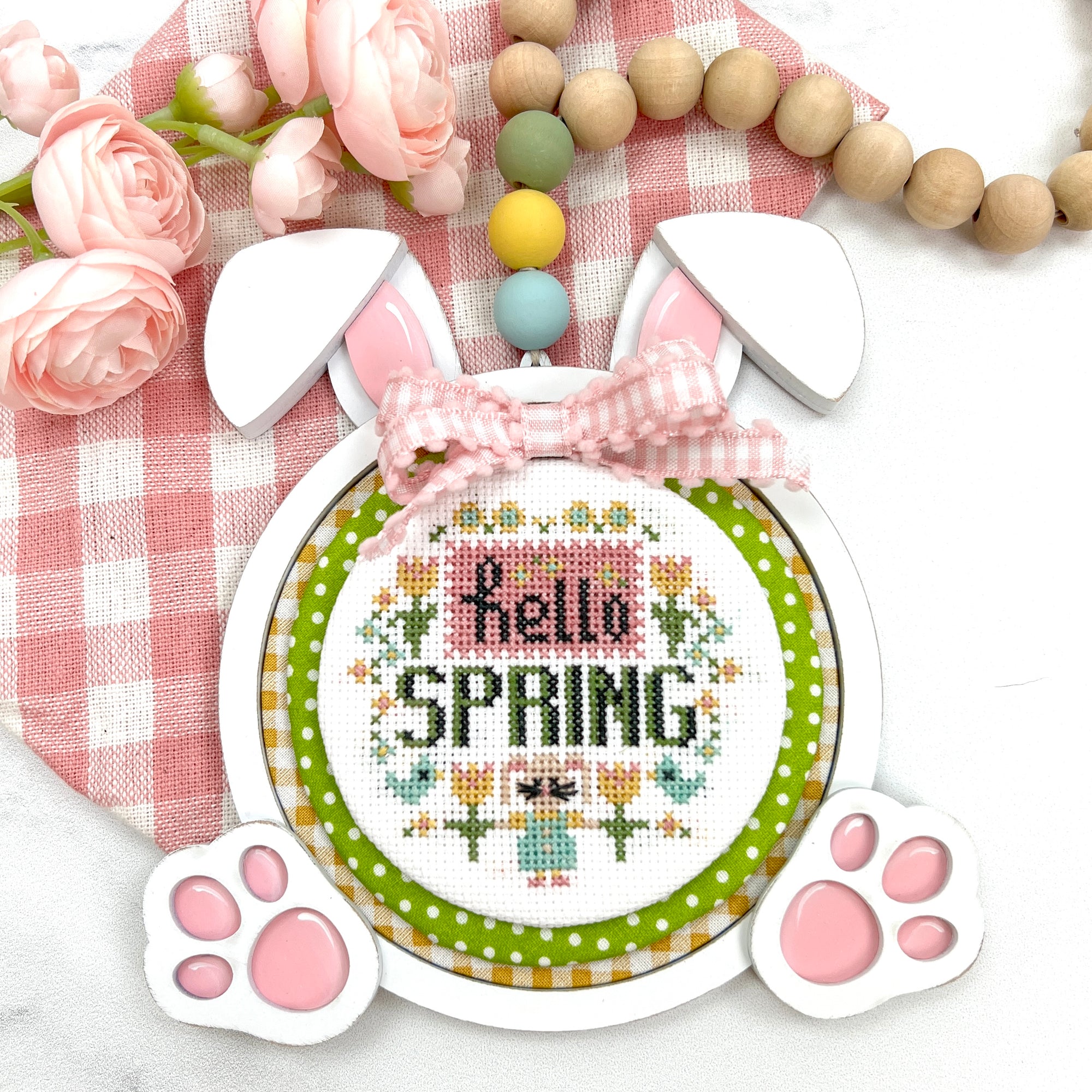 Hanging bunny wood cross stitch display for round cross stitch pieces