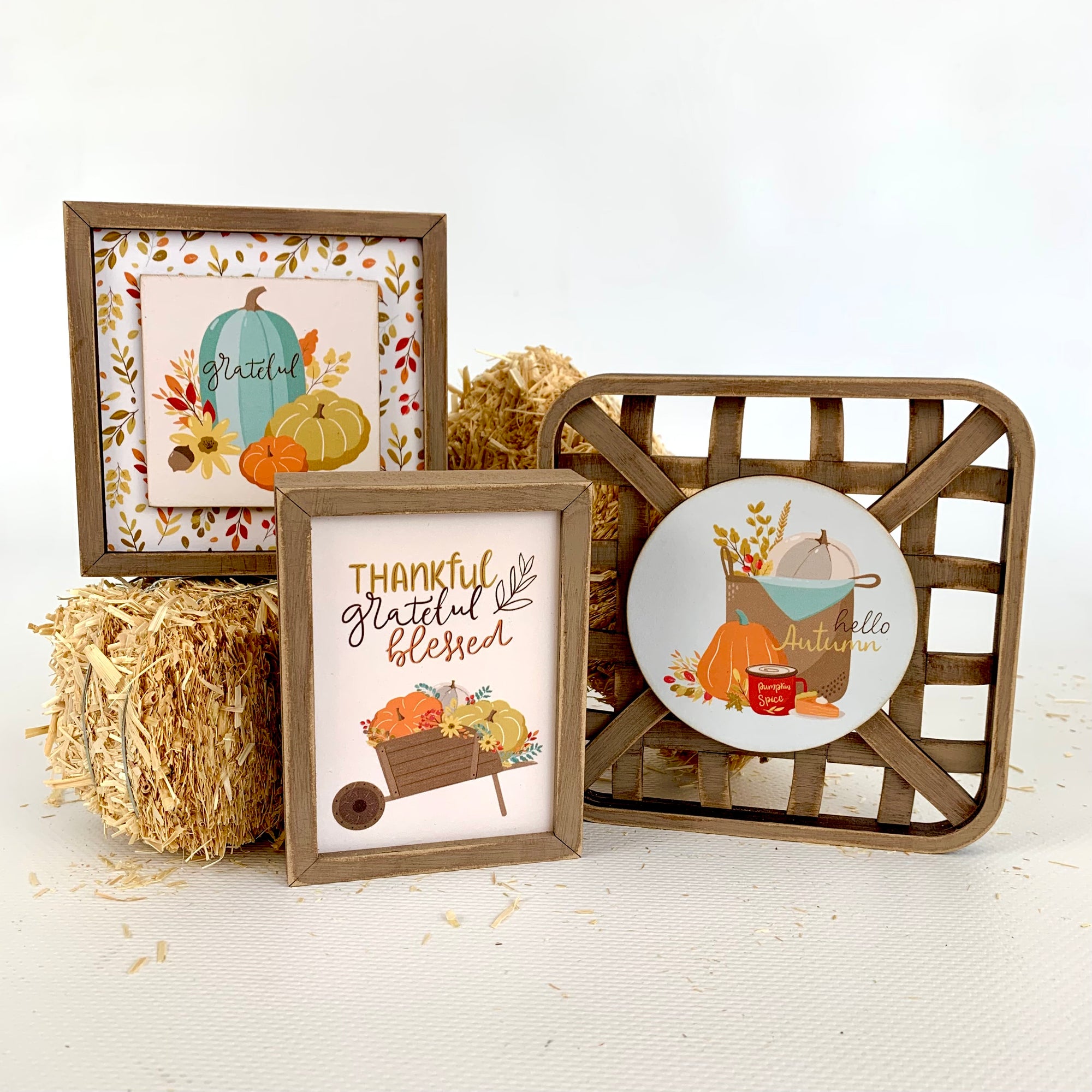 Grateful, thankful and blessed block signs for tiered tray decorations.  Lattice basket with hello autum phrase.  Thanksgiving and fall wood home decorations.