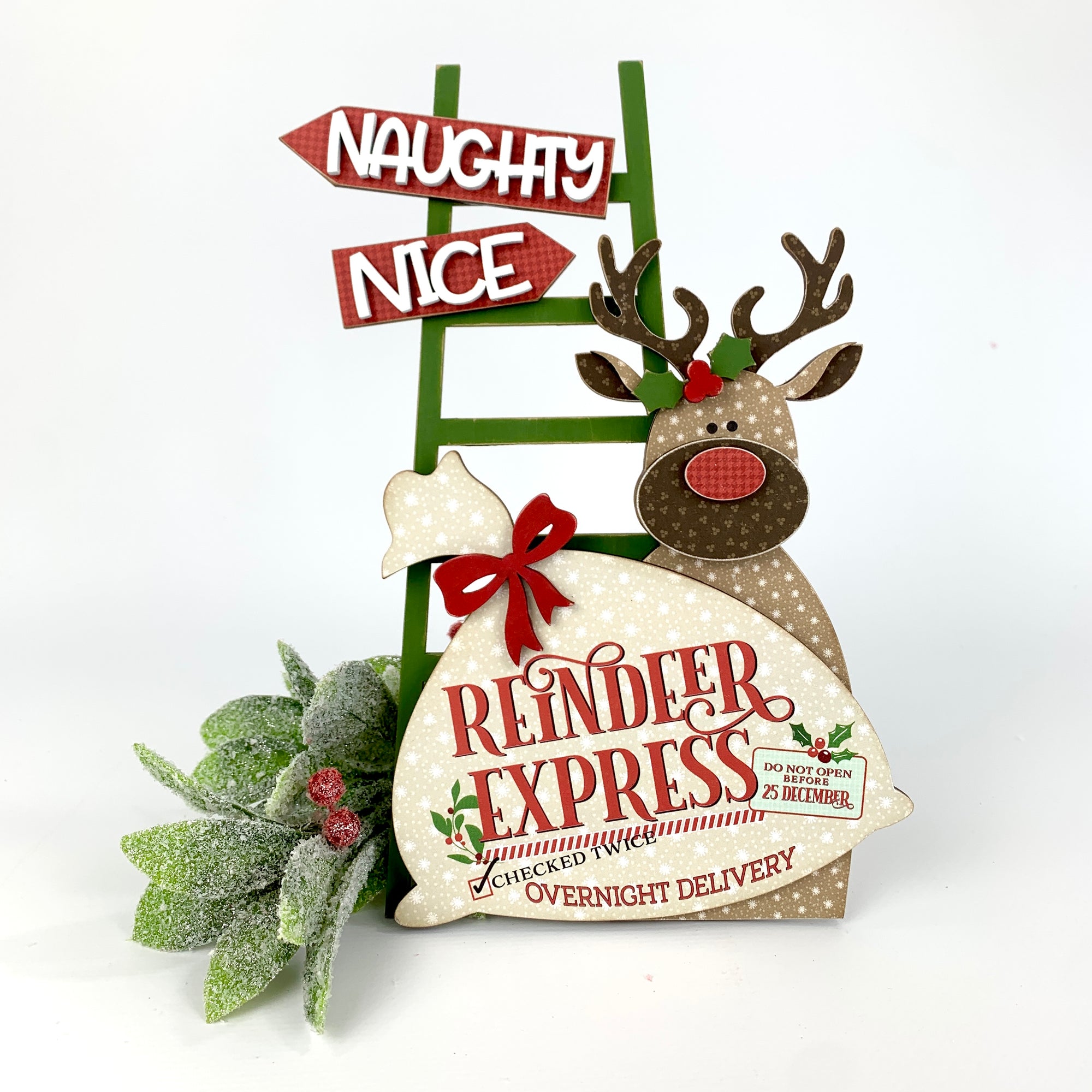 Ladder for Christmas teired tray with a reindeer holding a Santa Express mail bag. Ladder has naughty or nice signs. Christmas reindeer tiered tray or decorative tray wood decor craft kit