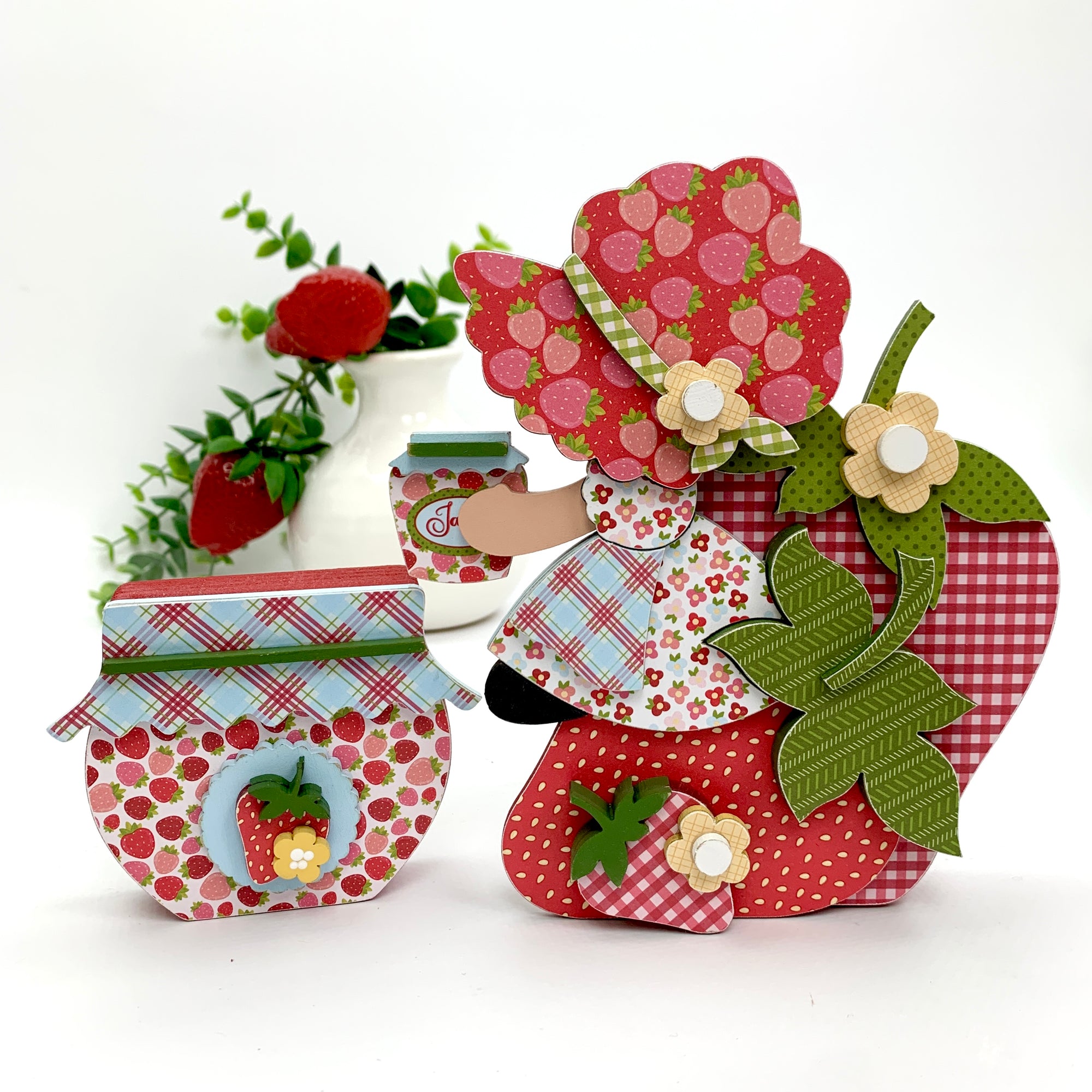 Strawberry girl sitting on strawberries and a jam jar wood decoration craft kit for tiered tray designing